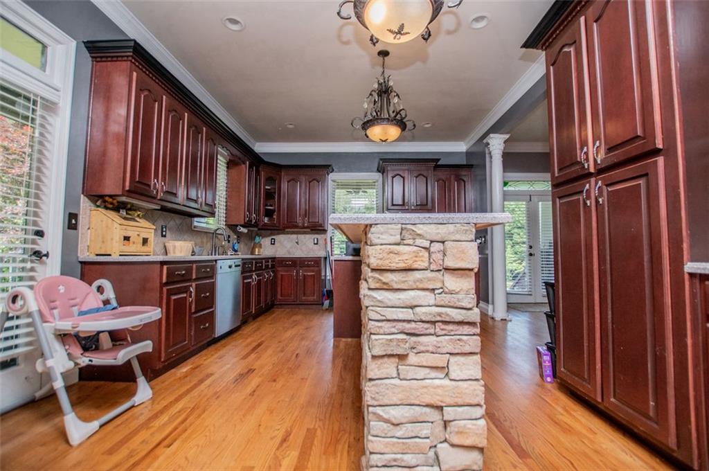 6919 Mt Zion Road Waco, GA 30182 - Photo 27 of 79 a kitchen with a refrigerator and a stove top oven