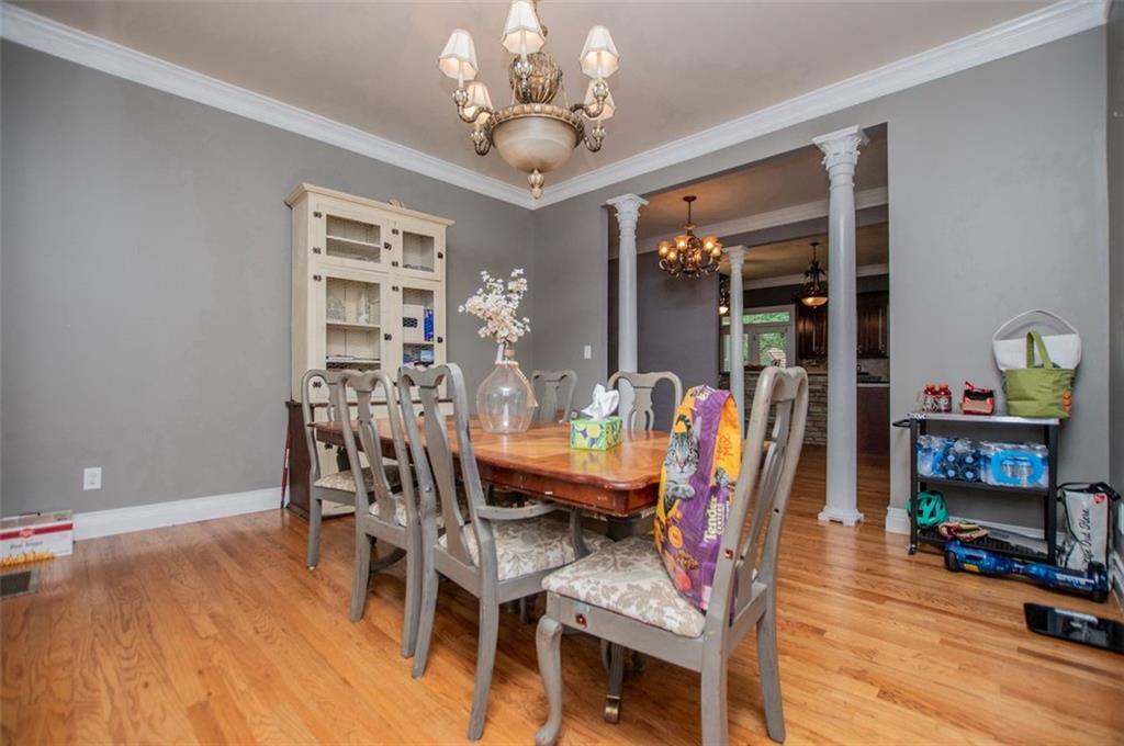 6919 Mt Zion Road Waco, GA 30182 - Photo 35 of 79 a view of a dining room with furniture and wooden floor