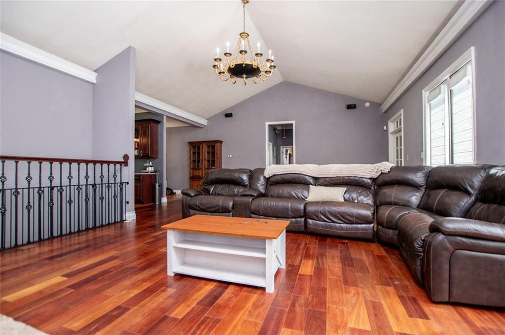 6919 Mt Zion Road Waco, GA 30182 - Photo 38 of 79 a living room with furniture and a wooden floor