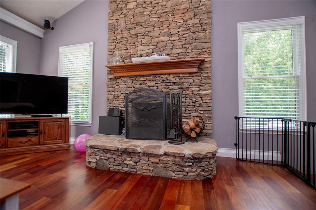 6919 Mt Zion Road Waco, GA 30182 - Photo 40 of 79 a living room with furniture and a flat screen tv