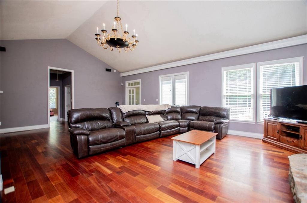 6919 Mt Zion Road Waco, GA 30182 - Photo 41 of 79 a living room with fireplace furniture and a flat screen tv