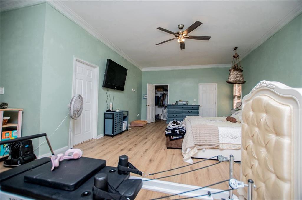 6919 Mt Zion Road Waco, GA 30182 - Photo 47 of 79 a living room with furniture and a flat screen tv