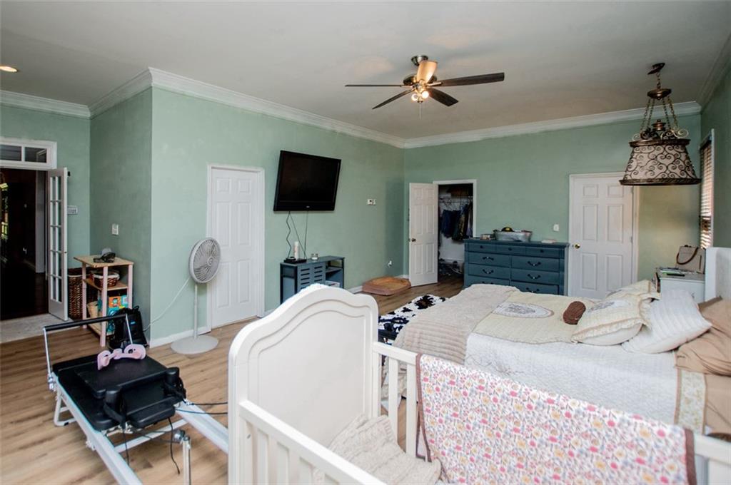 6919 Mt Zion Road Waco, GA 30182 - Photo 48 of 79 a living room with furniture and a flat screen tv