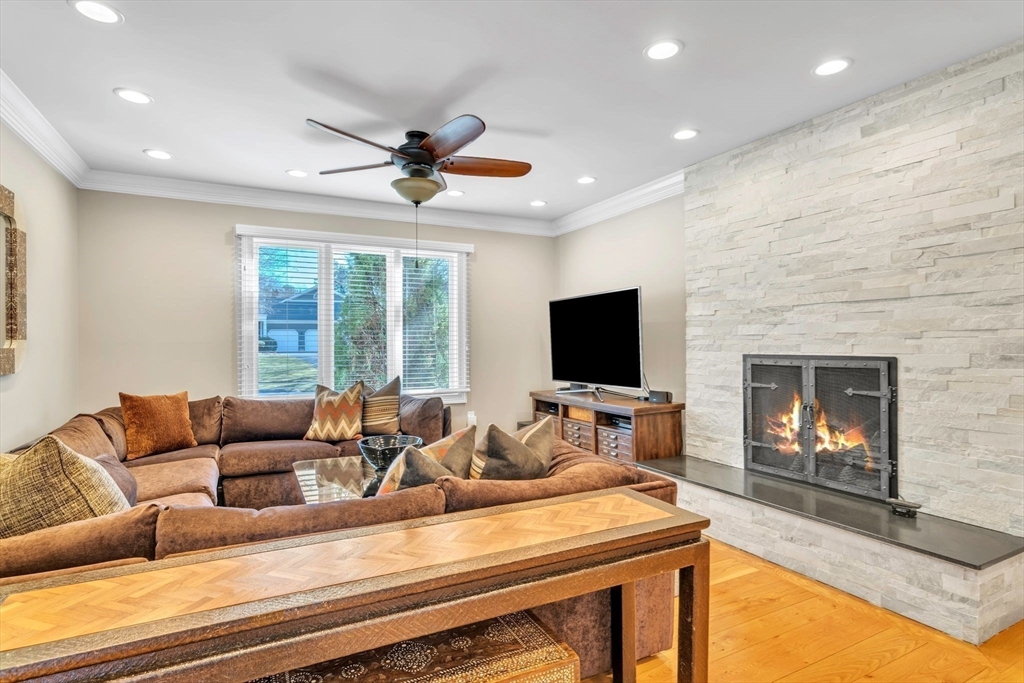 84 Willow Brook Road Longmeadow, MA 01106 - Photo 17 of 42 a living room with furniture and a flat screen tv