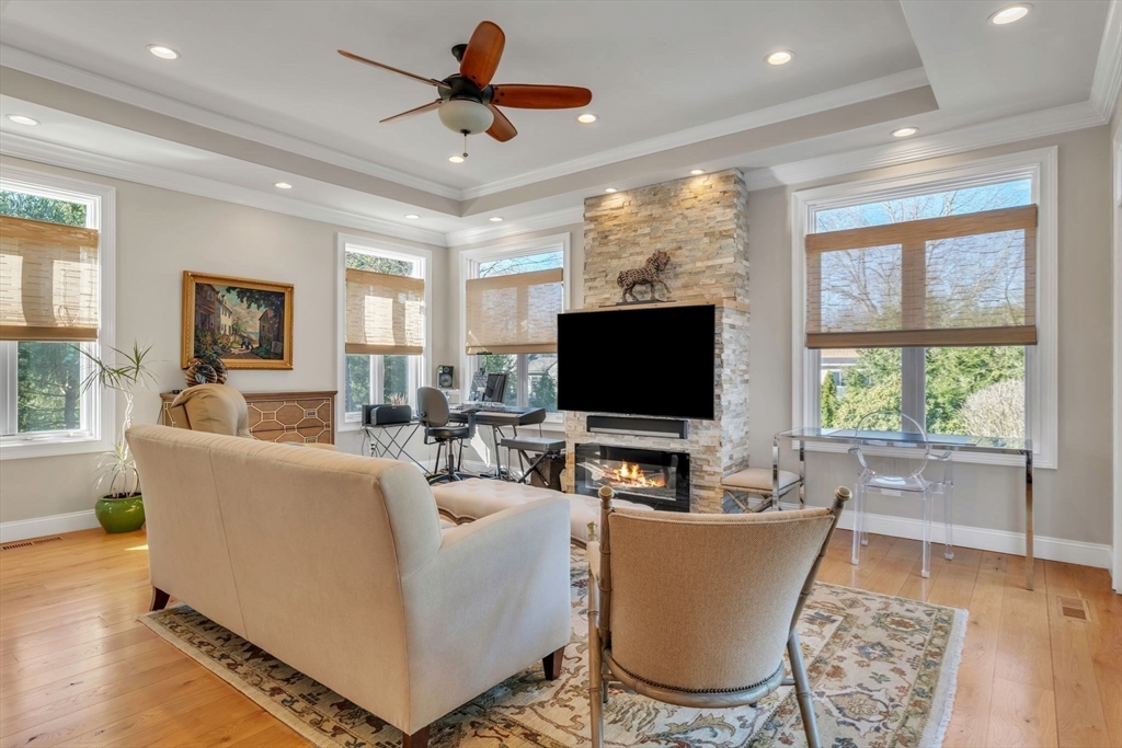 84 Willow Brook Road Longmeadow, MA 01106 - Photo 20 of 42 a living room with furniture and a flat screen tv