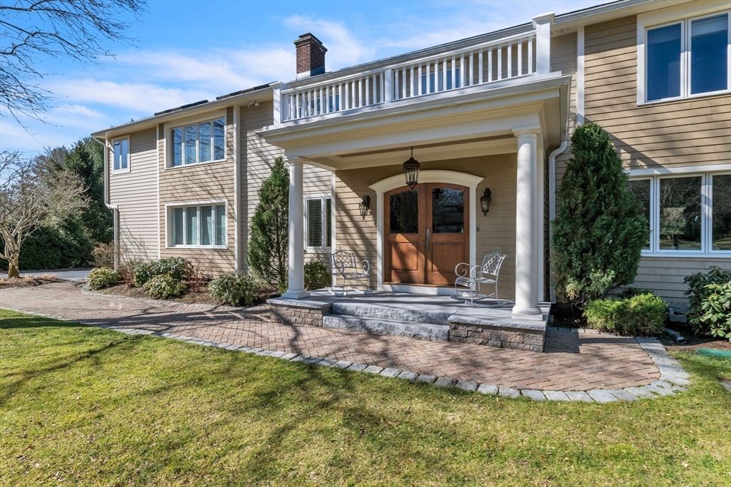 84 Willow Brook Road Longmeadow, MA 01106 - Photo 2 of 42 a front view of a house with garden