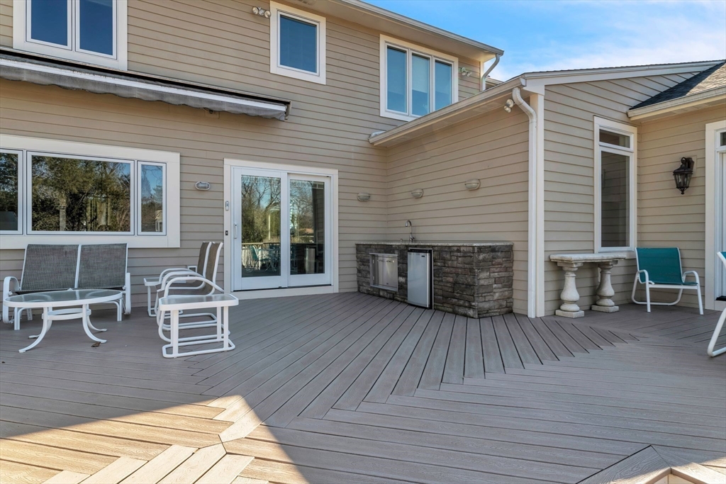 84 Willow Brook Road Longmeadow, MA 01106 - Photo 41 of 42 front view of a house with a patio