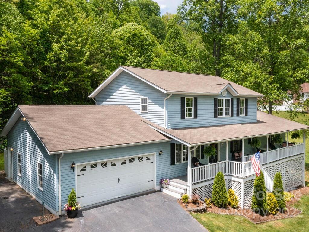 15 Devonshire Drive Candler, NC 28715 - Photo 1 of 43 a aerial view of a house with a yard balcony and seating area