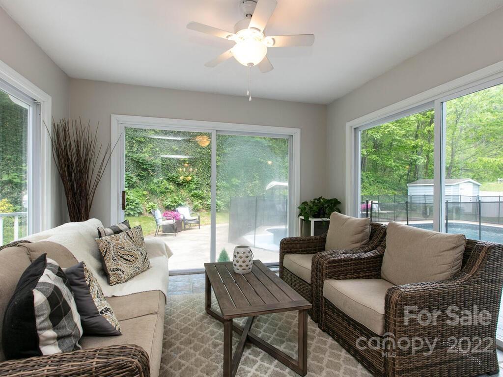 15 Devonshire Drive Candler, NC 28715 - Photo 17 of 43 a living room with furniture and a large window