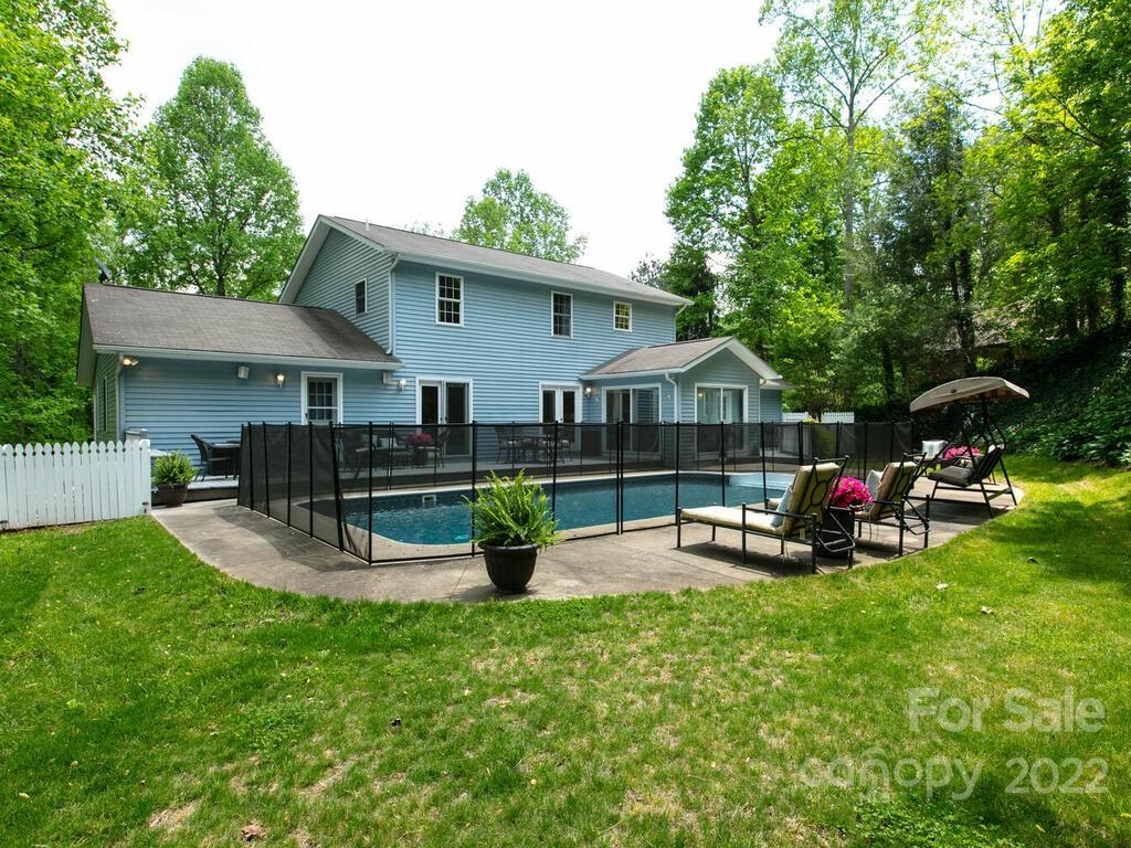 15 Devonshire Drive Candler, NC 28715 - Photo 3 of 43 a view of a house with a yard and sitting area