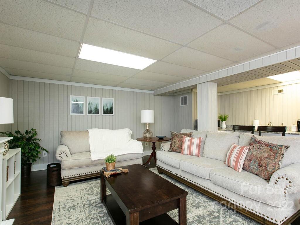 15 Devonshire Drive Candler, NC 28715 - Photo 31 of 43 a living room with furniture and a couch