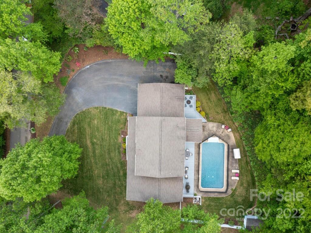 15 Devonshire Drive Candler, NC 28715 - Photo 39 of 43 an aerial view of a house with outdoor space and trees all around