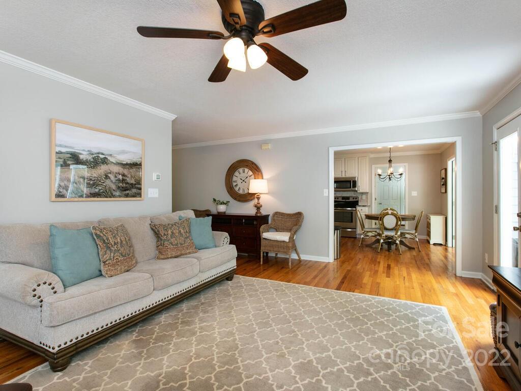 15 Devonshire Drive Candler, NC 28715 - Photo 8 of 43 a living room with furniture and a wooden floor