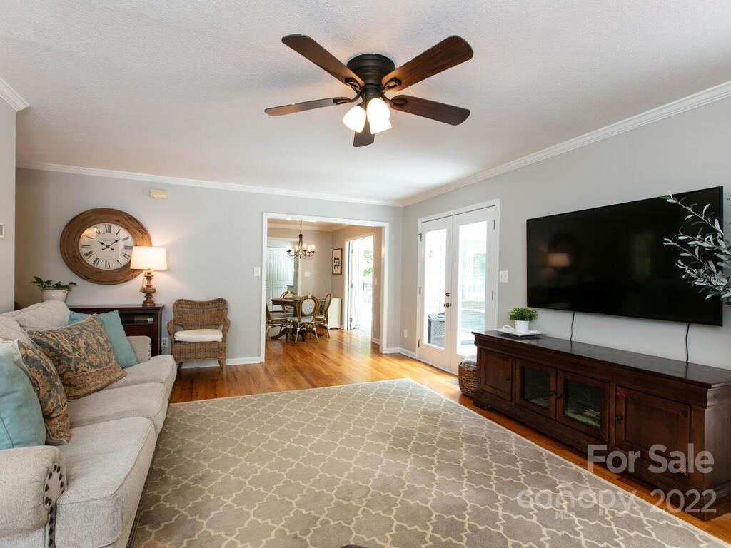 15 Devonshire Drive Candler, NC 28715 - Photo 9 of 43 a living room with furniture and a flat screen tv