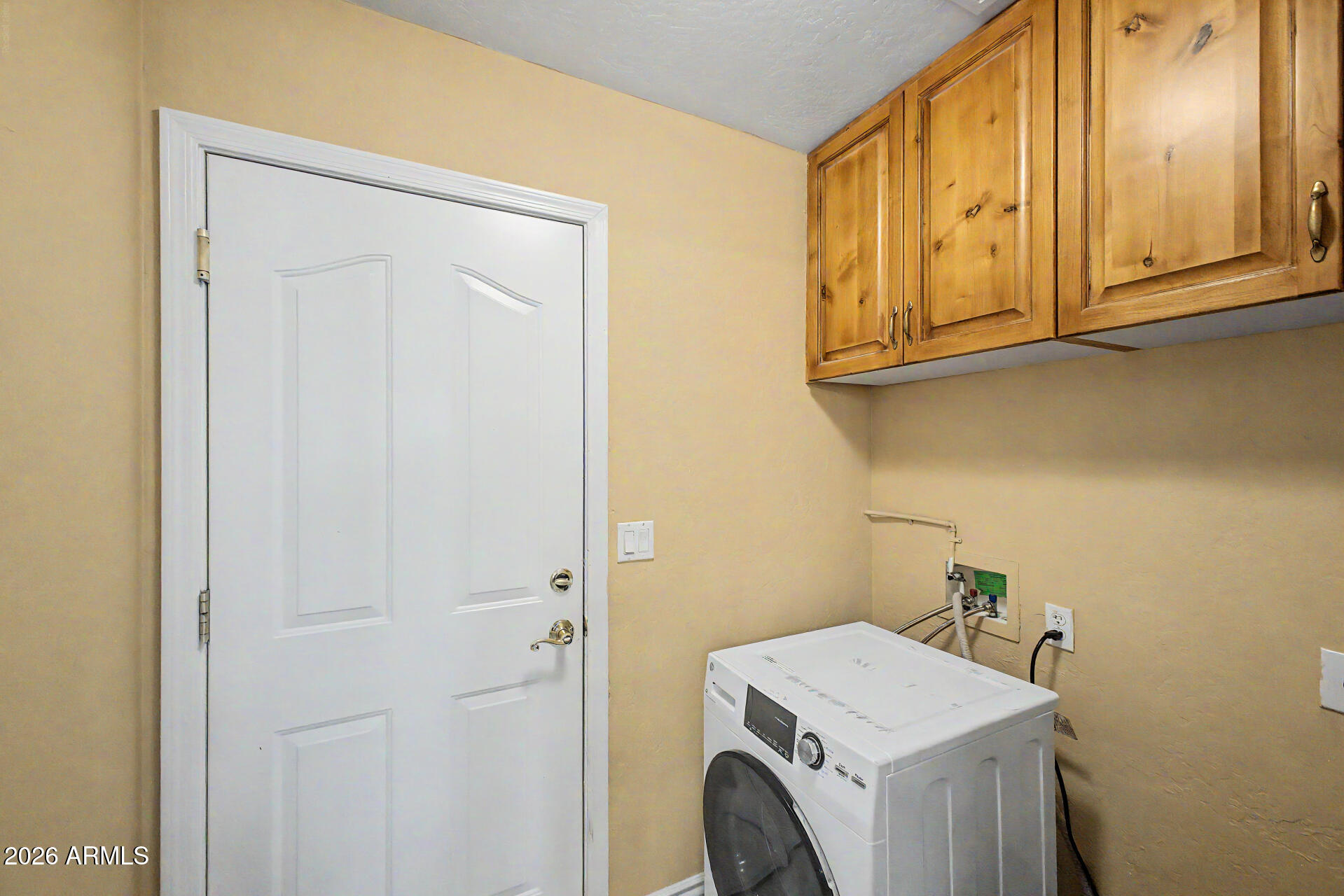 802 East Roberts Road Phoenix, AZ 85022 - Photo 18 of 24 a utility room with dryer and washer