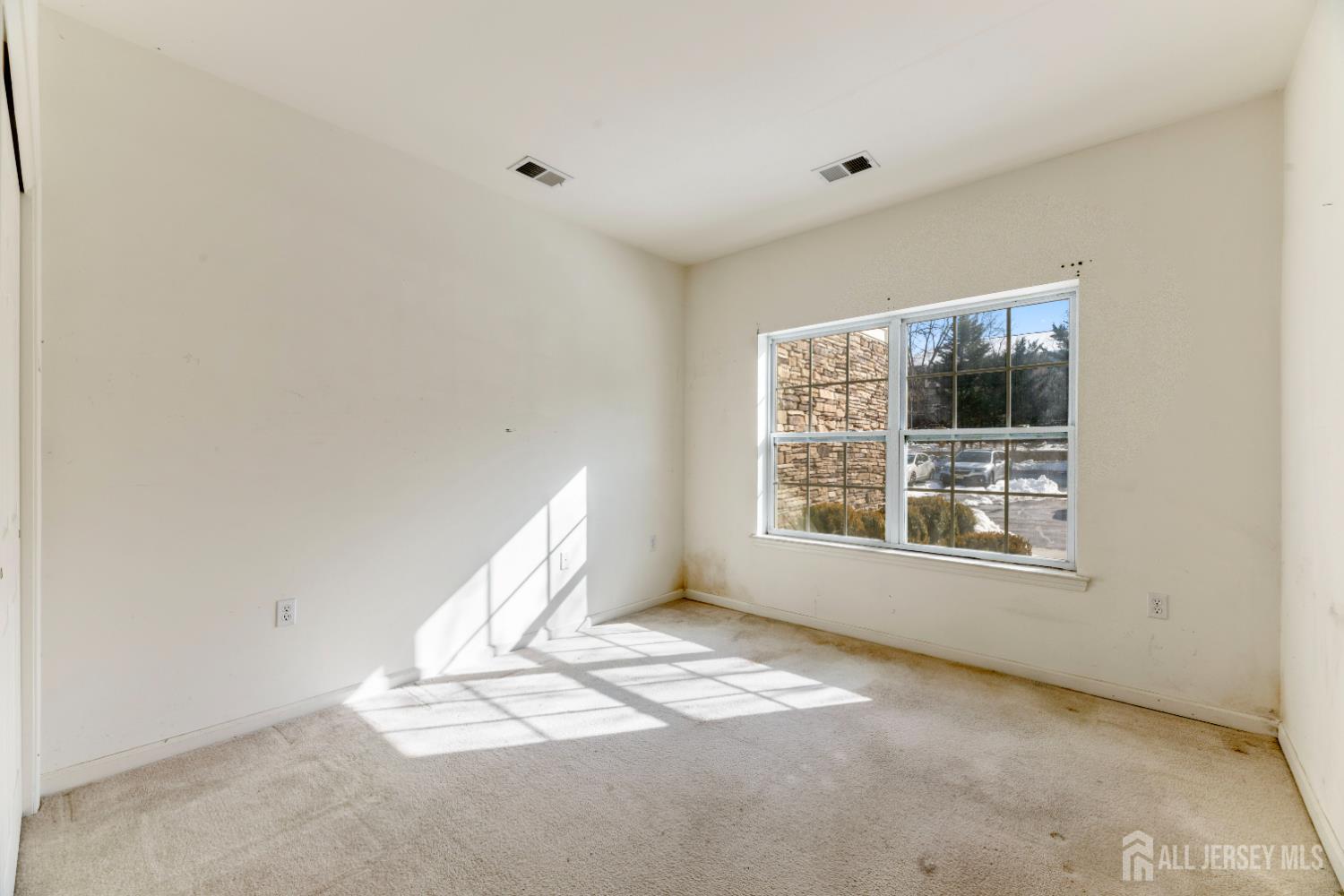 540 Cranbury Road, Unit 104 East Brunswick, NJ 08816 - Photo 19 of 43 a view of a livingroom with a window