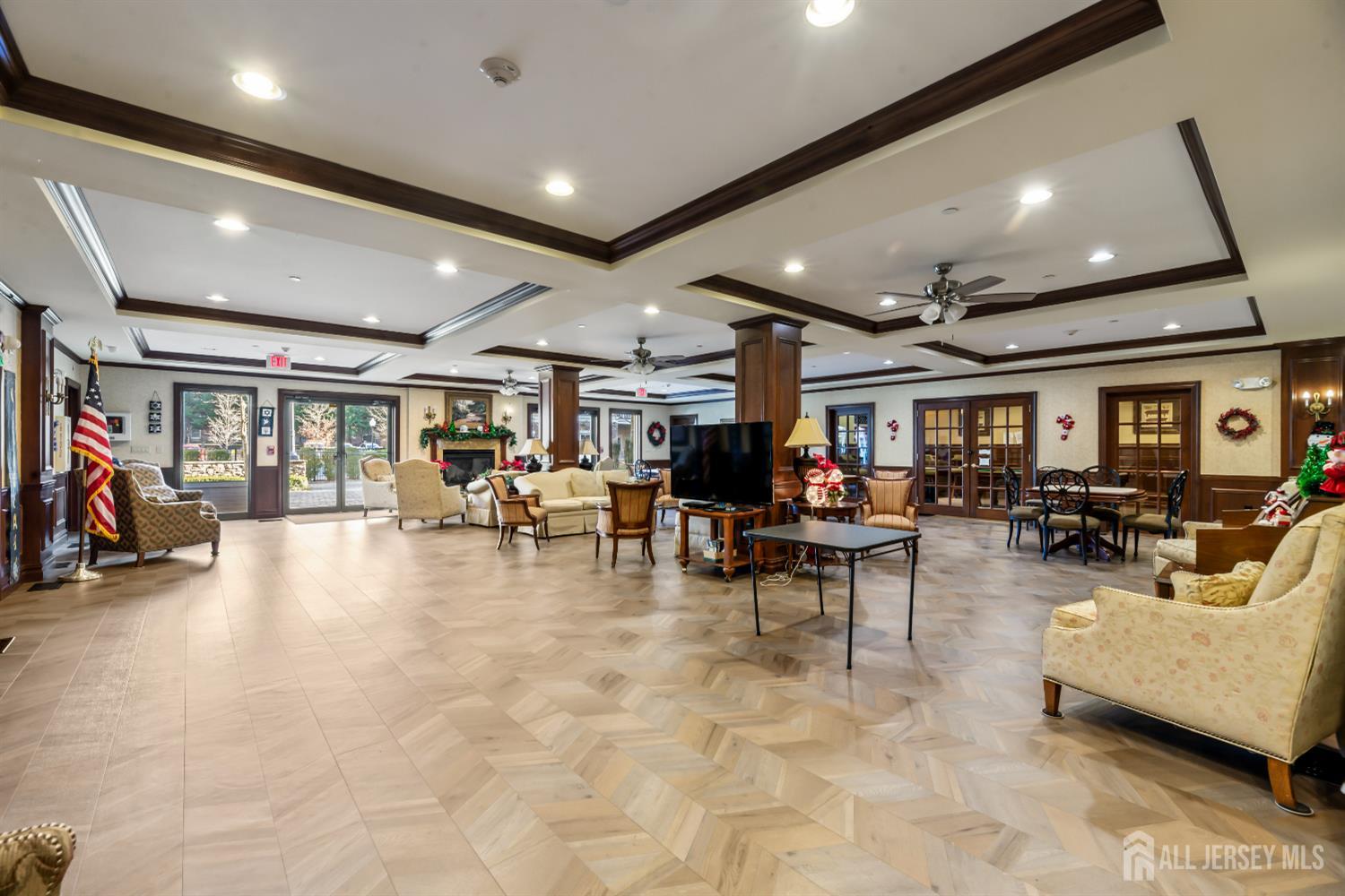 540 Cranbury Road, Unit 104 East Brunswick, NJ 08816 - Photo 27 of 43 a view of a room with gym equipment and a large window