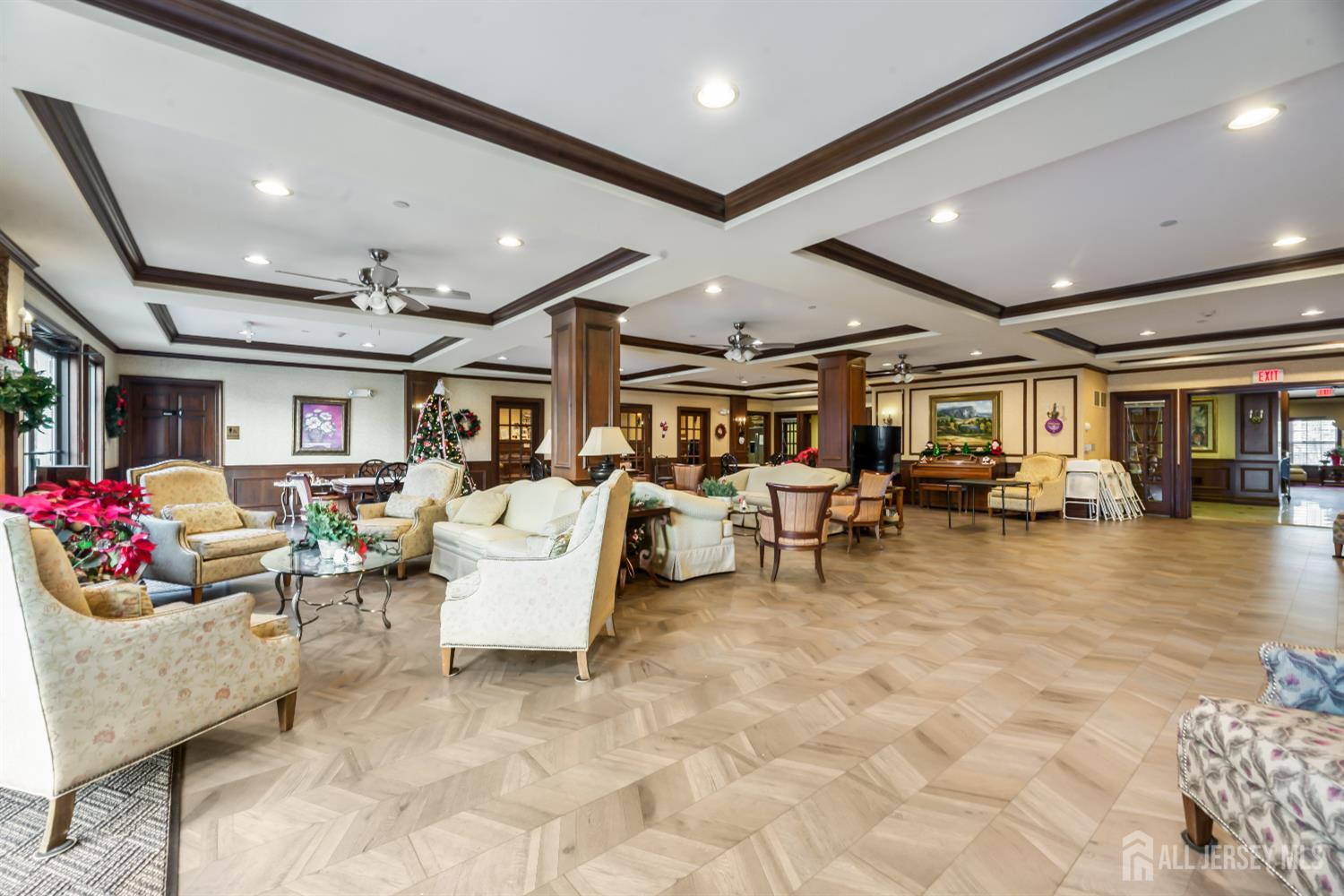 540 Cranbury Road, Unit 104 East Brunswick, NJ 08816 - Photo 28 of 43 a living room with furniture and a gym