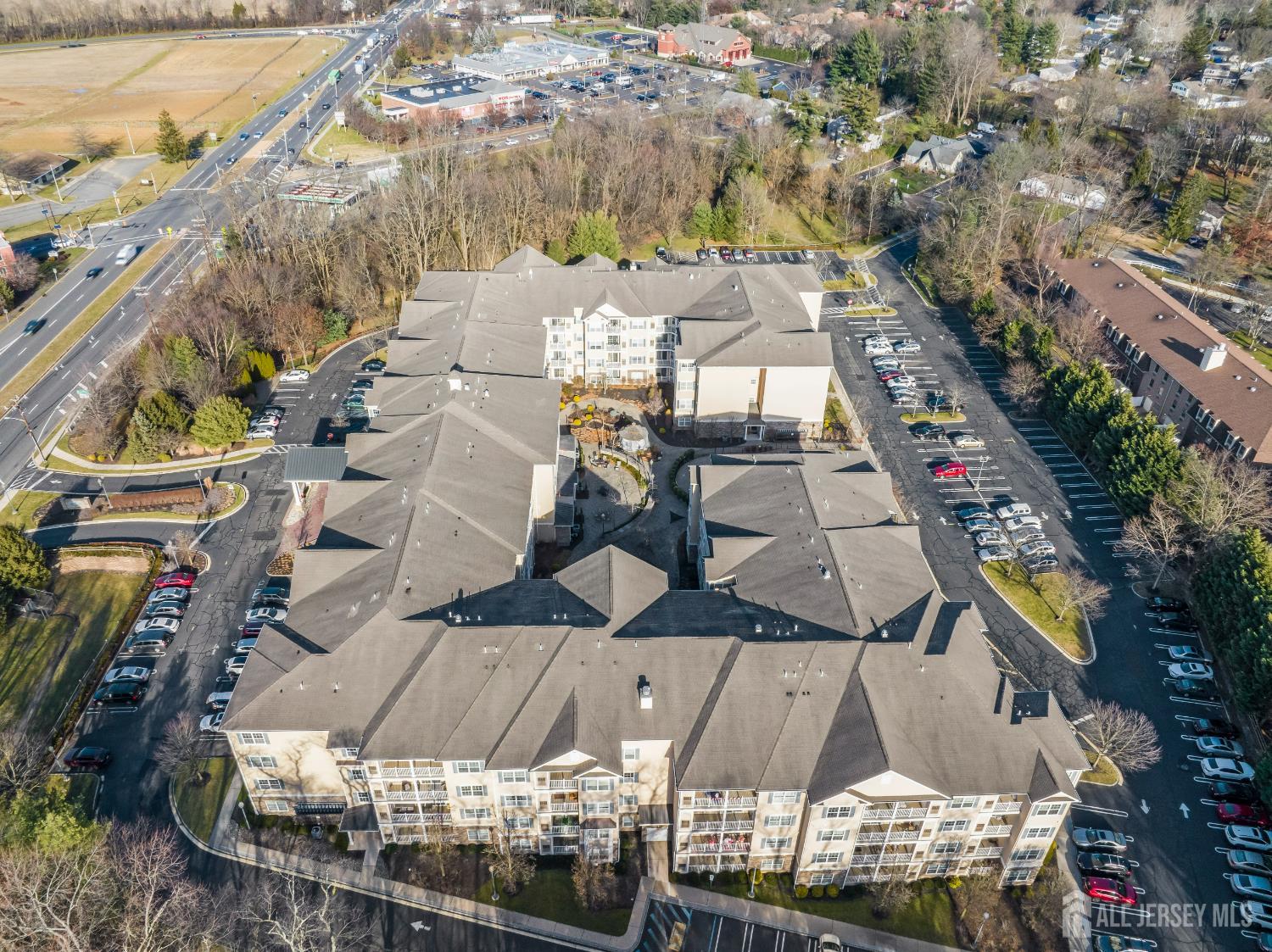 540 Cranbury Road, Unit 104 East Brunswick, NJ 08816 - Photo 40 of 43 an aerial view of a house with outdoor space