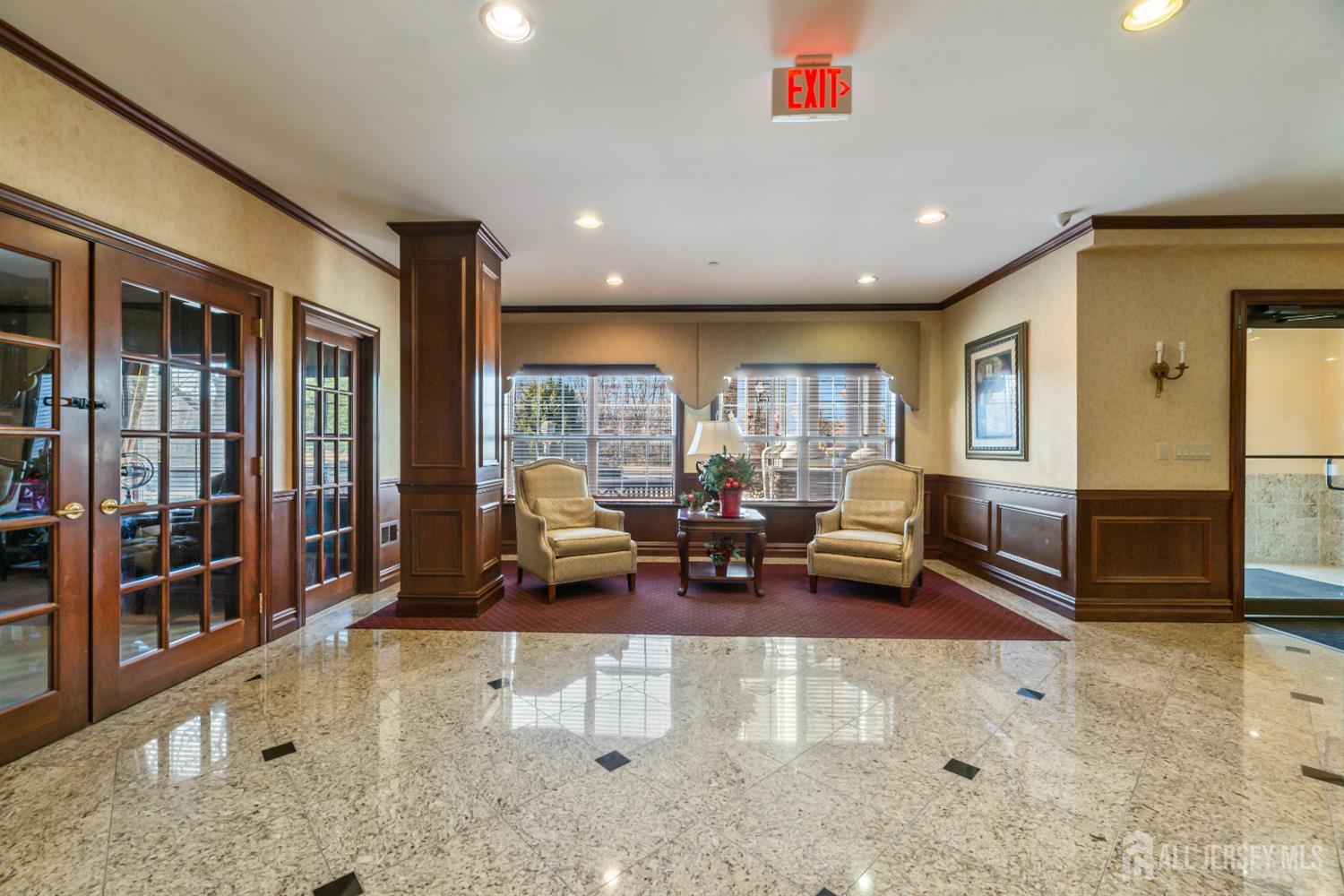 540 Cranbury Road, Unit 104 East Brunswick, NJ 08816 - Photo 4 of 43 a living room with furniture