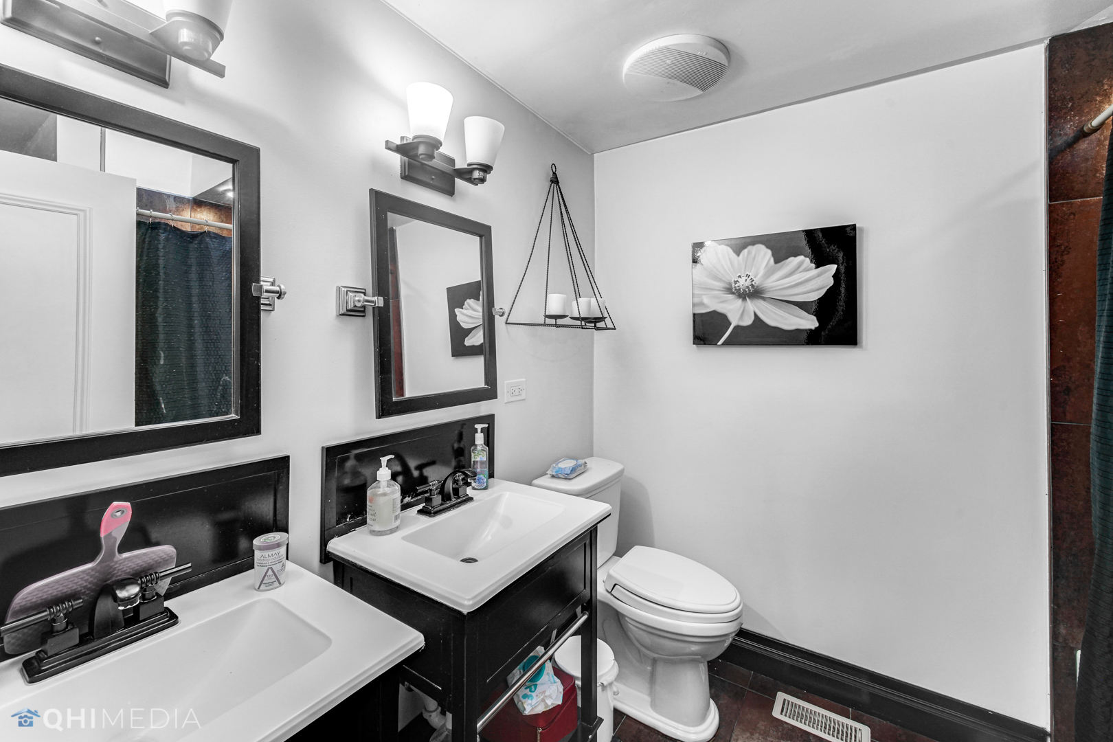 1076 Aberdeen Road Inverness, IL 60067 - Photo 17 of 21 a bathroom with a sink vanity mirror and toilet