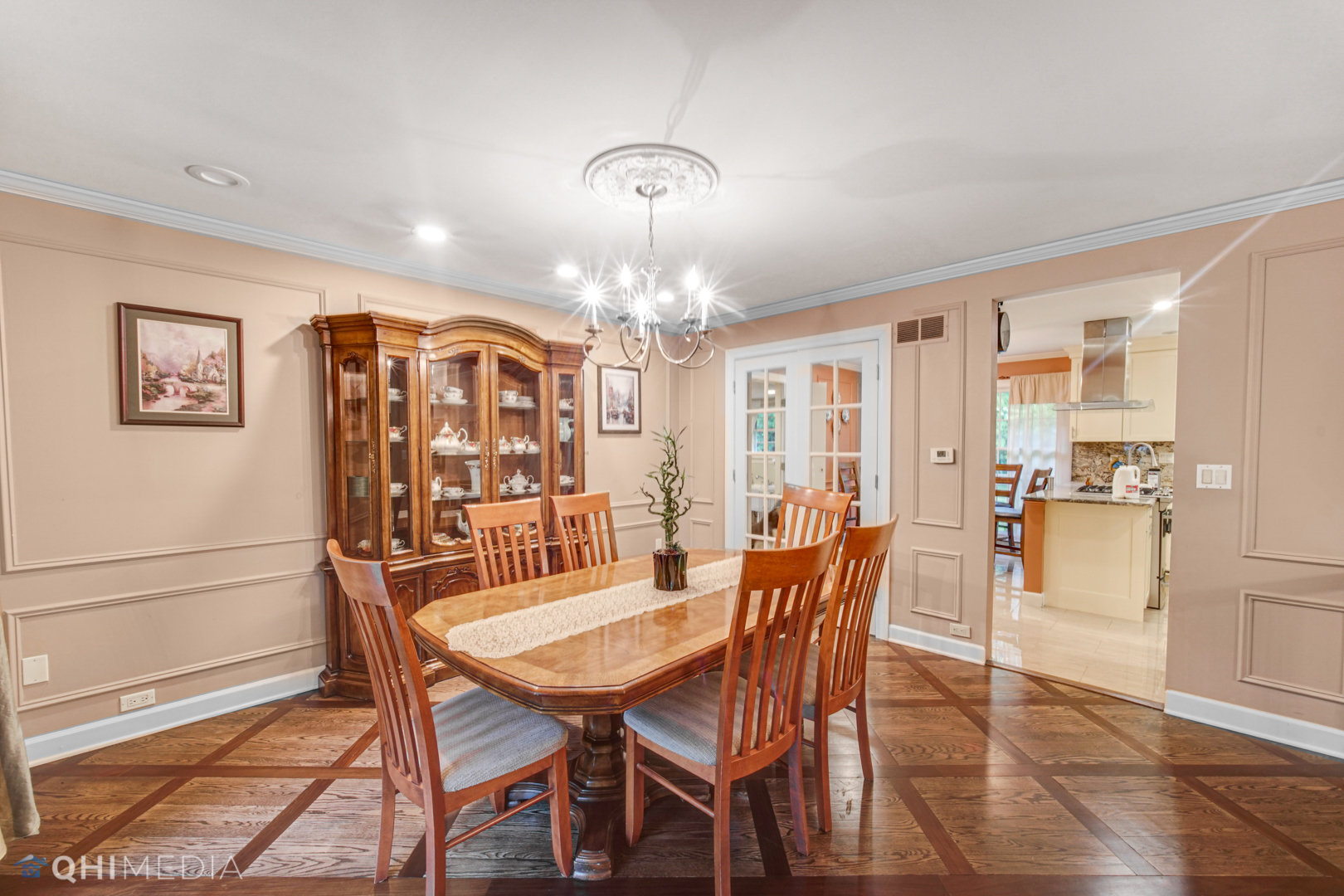 1076 Aberdeen Road Inverness, IL 60067 - Photo 5 of 21 a view of a dining room with furniture and chandelier