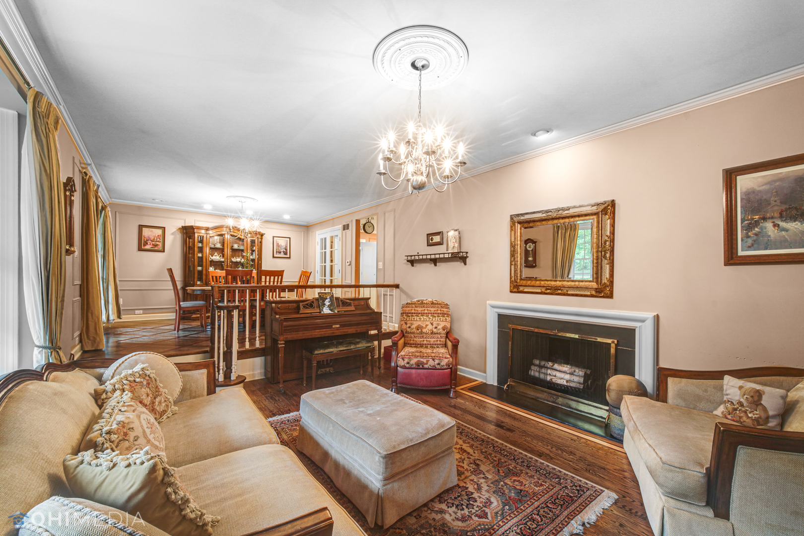 1076 Aberdeen Road Inverness, IL 60067 - Photo 8 of 21 a living room with furniture and a fireplace