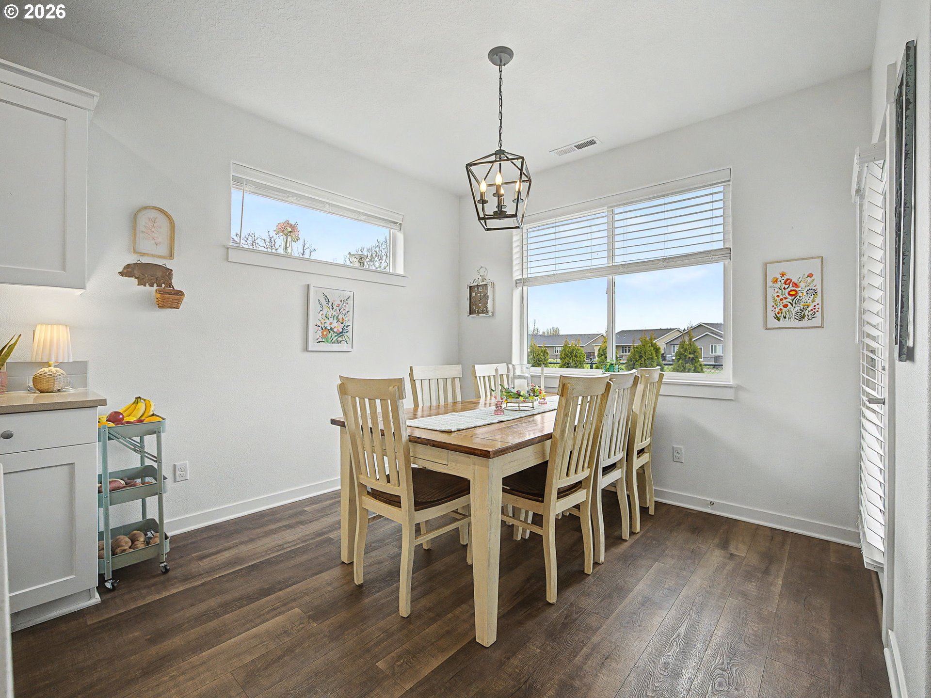 245 Northeast Hill Way Estacada, OR 97023 - Photo 16 of 45 a view of a dining room with furniture wooden floor and chandelier