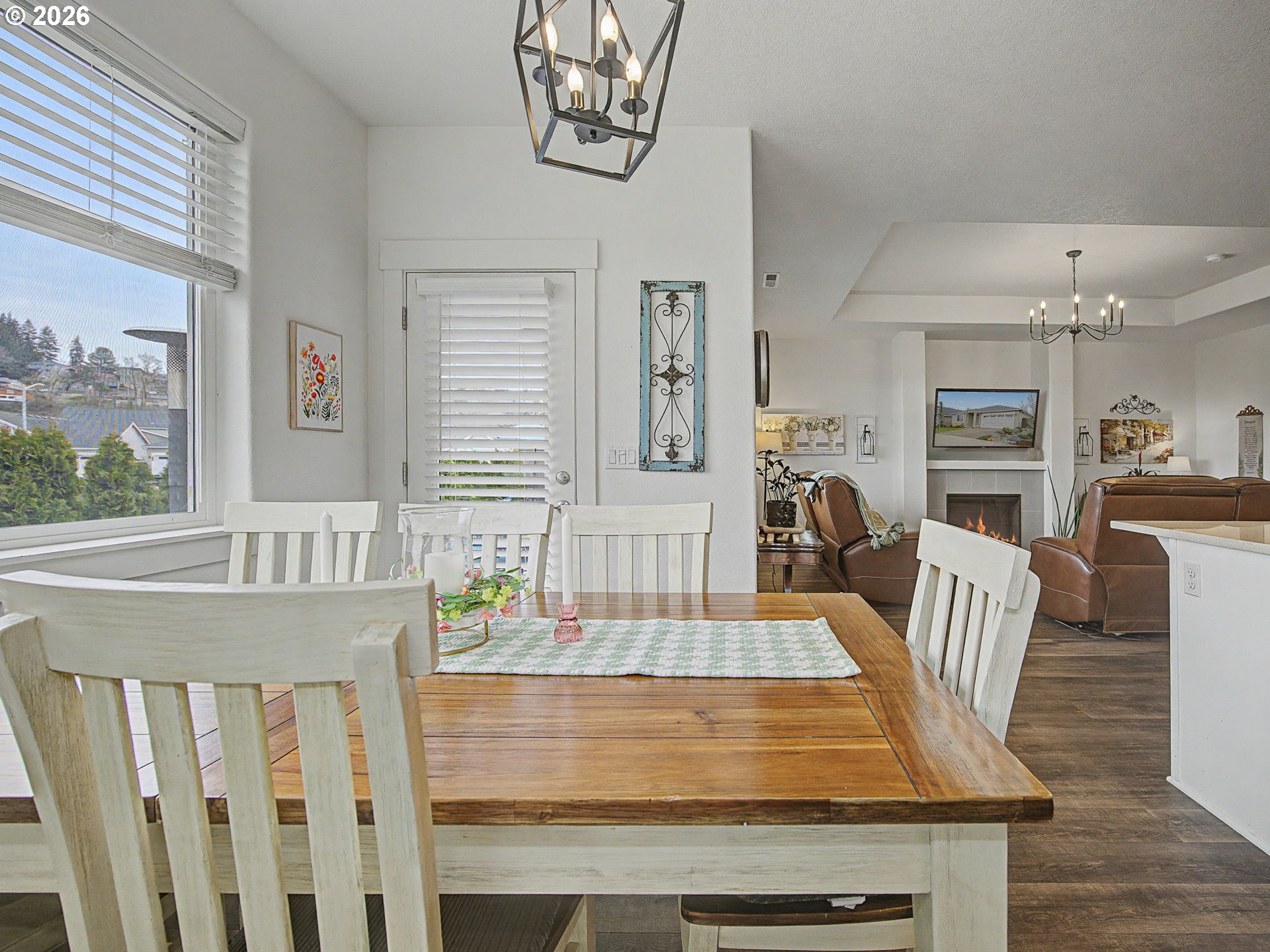 245 Northeast Hill Way Estacada, OR 97023 - Photo 17 of 45 a view of a dining room with furniture window and wooden floor
