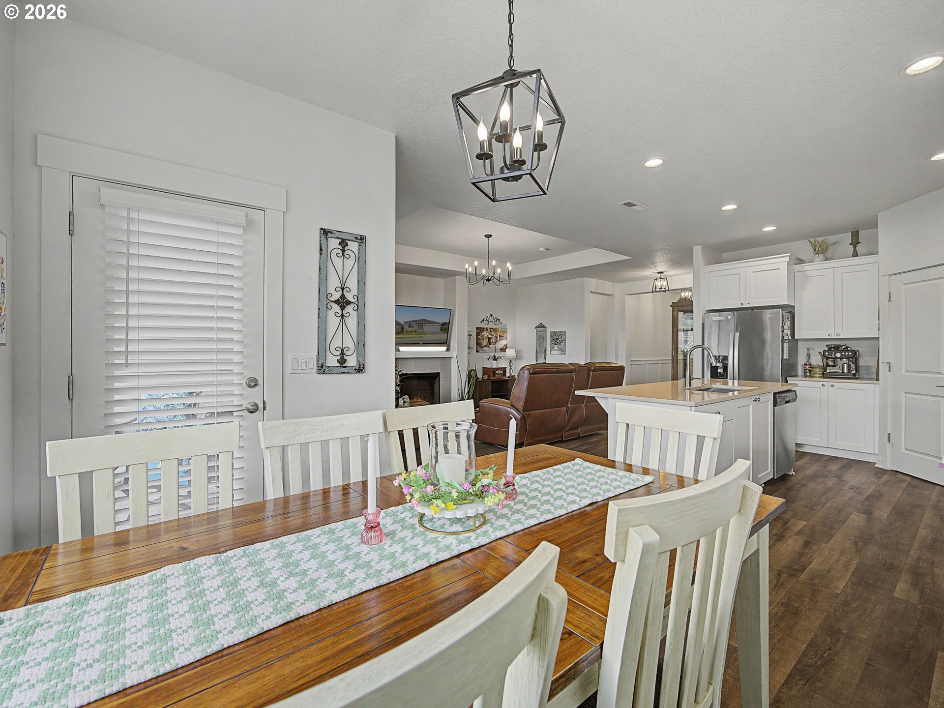 245 Northeast Hill Way Estacada, OR 97023 - Photo 18 of 45 a living room with kitchen island granite countertop furniture and a chandelier
