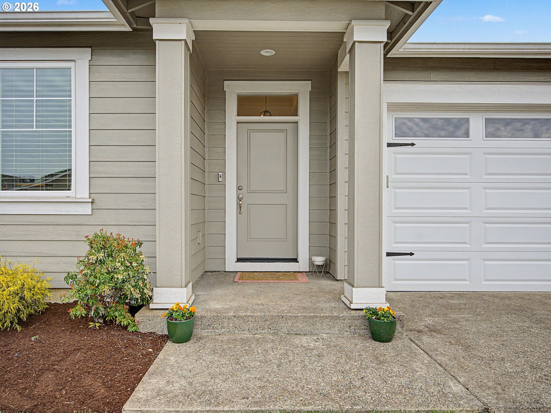 245 Northeast Hill Way Estacada, OR 97023 - Photo 2 of 45 a view of front door of house with potted plant
