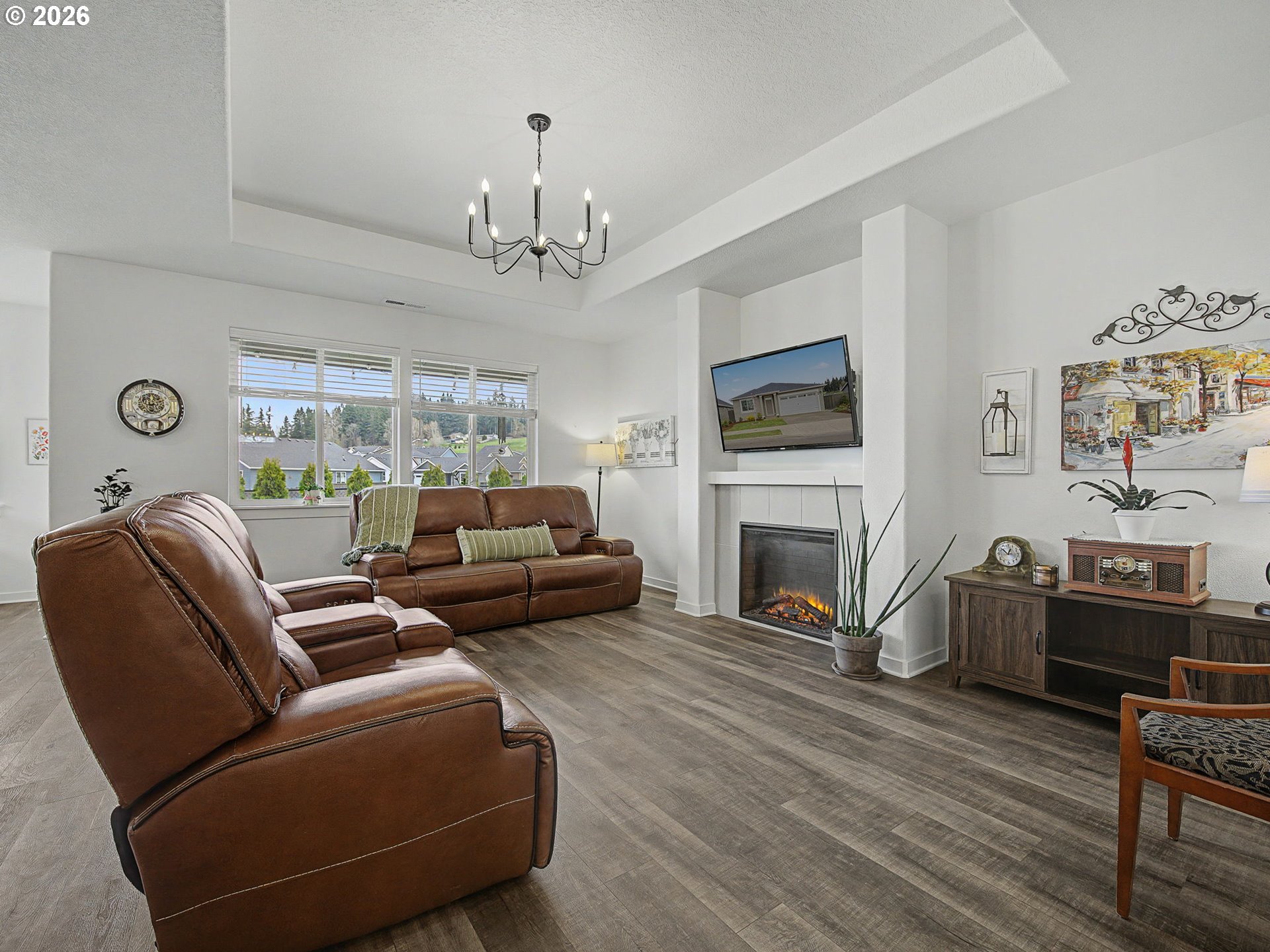 245 Northeast Hill Way Estacada, OR 97023 - Photo 21 of 45 a living room with furniture fireplace and flat screen tv