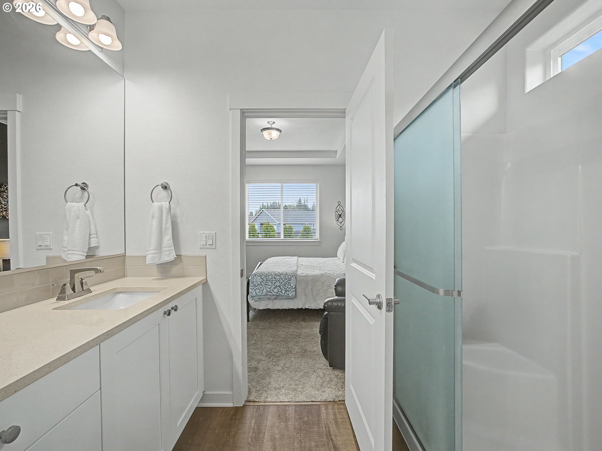 245 Northeast Hill Way Estacada, OR 97023 - Photo 31 of 45 a en suite bathroom with a granite countertop sink and a mirror