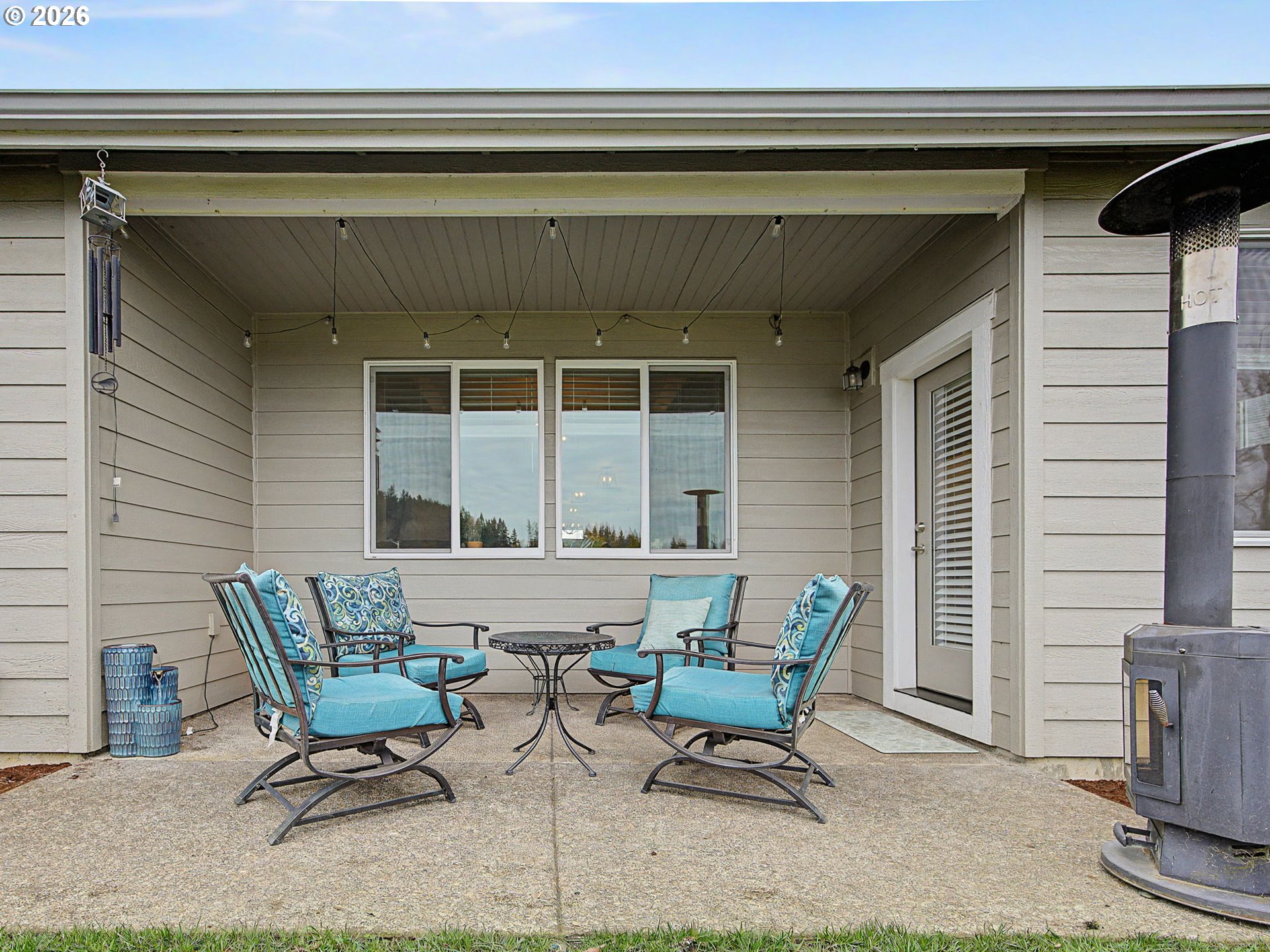 245 Northeast Hill Way Estacada, OR 97023 - Photo 35 of 45 a building outdoor space with patio furniture and potted plants