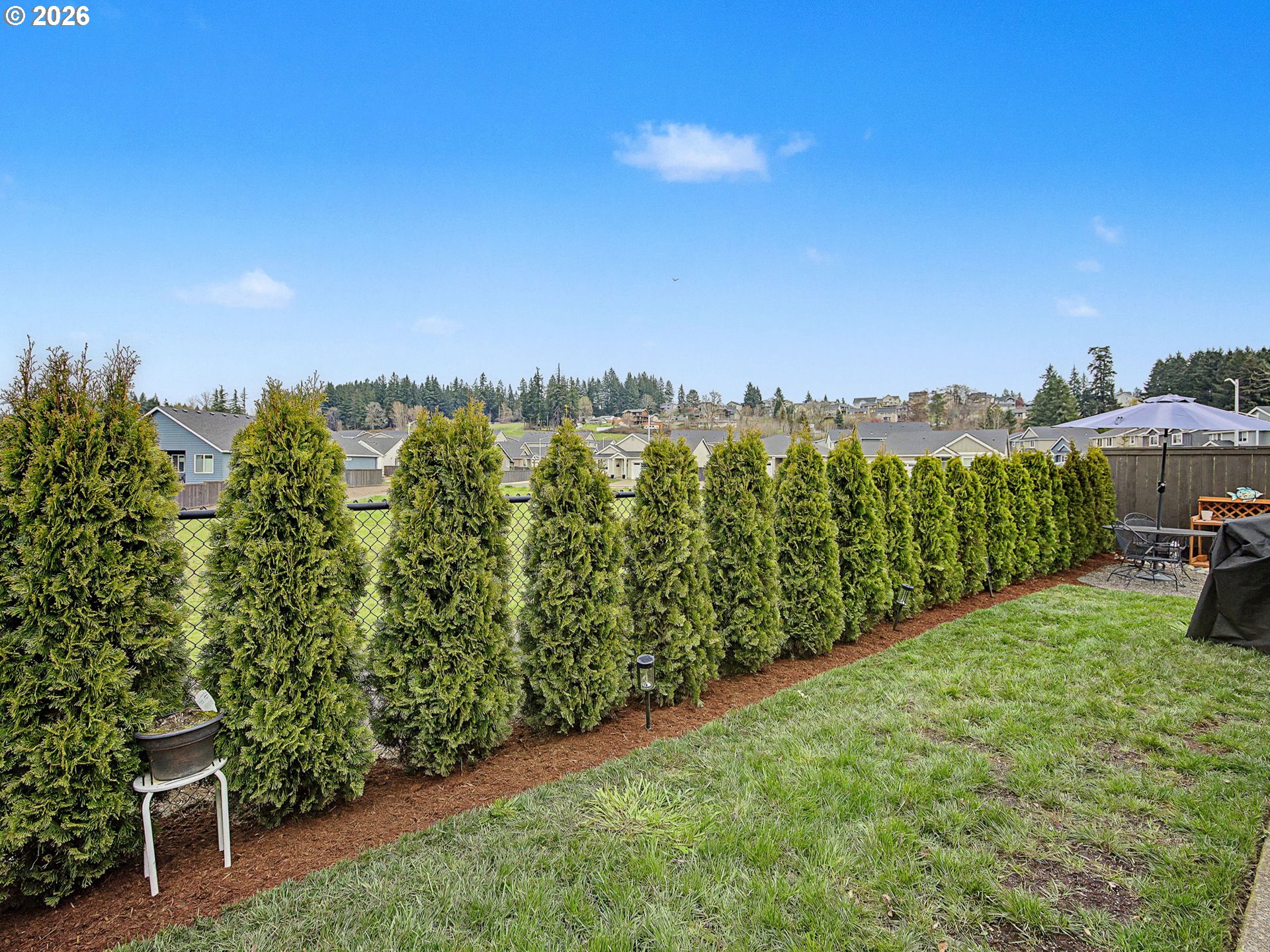 245 Northeast Hill Way Estacada, OR 97023 - Photo 37 of 45 a view of a garden with trees