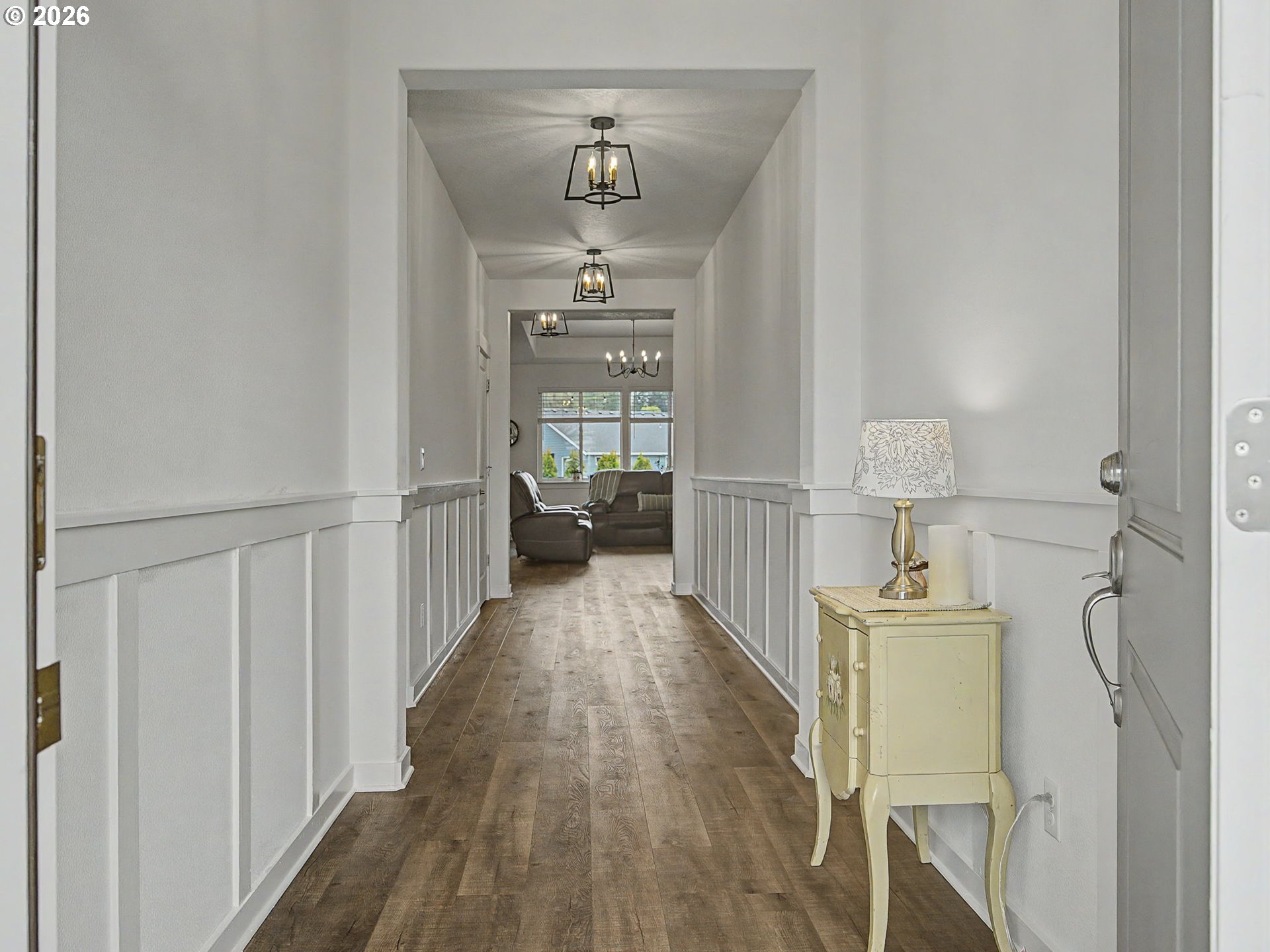 245 Northeast Hill Way Estacada, OR 97023 - Photo 4 of 45 a view of a hallway with wooden floor and entryway