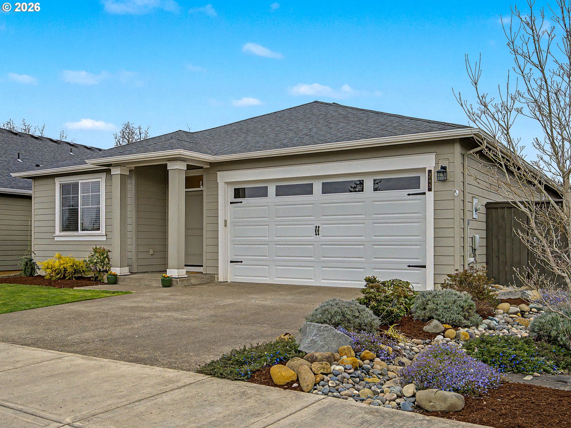 245 Northeast Hill Way Estacada, OR 97023 - Photo 42 of 45 a front view of a house with garden