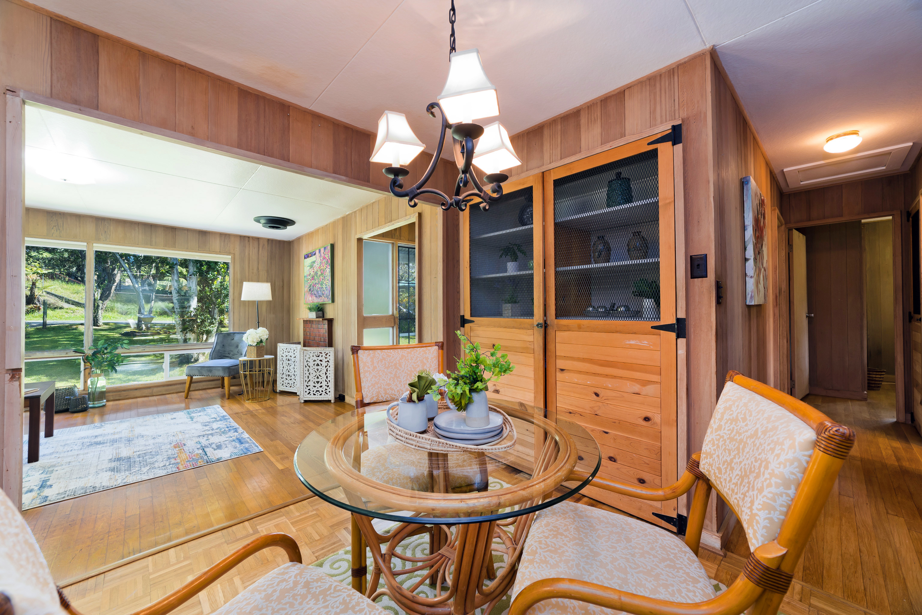 19-4113 Haunani Road Volcano, HI 96785 - Photo 12 of 30 a dining room with furniture a chandelier and window