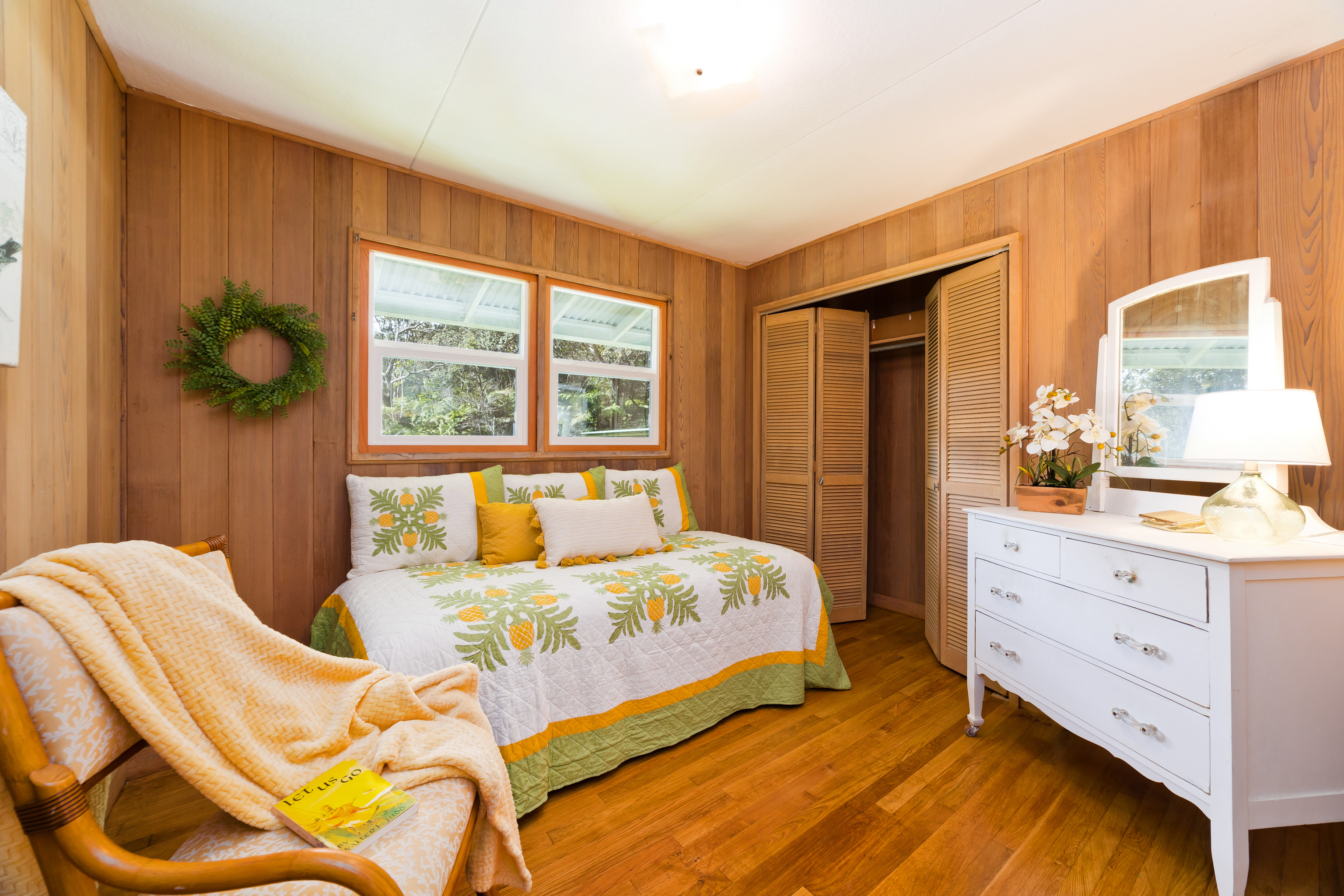 19-4113 Haunani Road Volcano, HI 96785 - Photo 16 of 30 a bedroom with a bed and a window