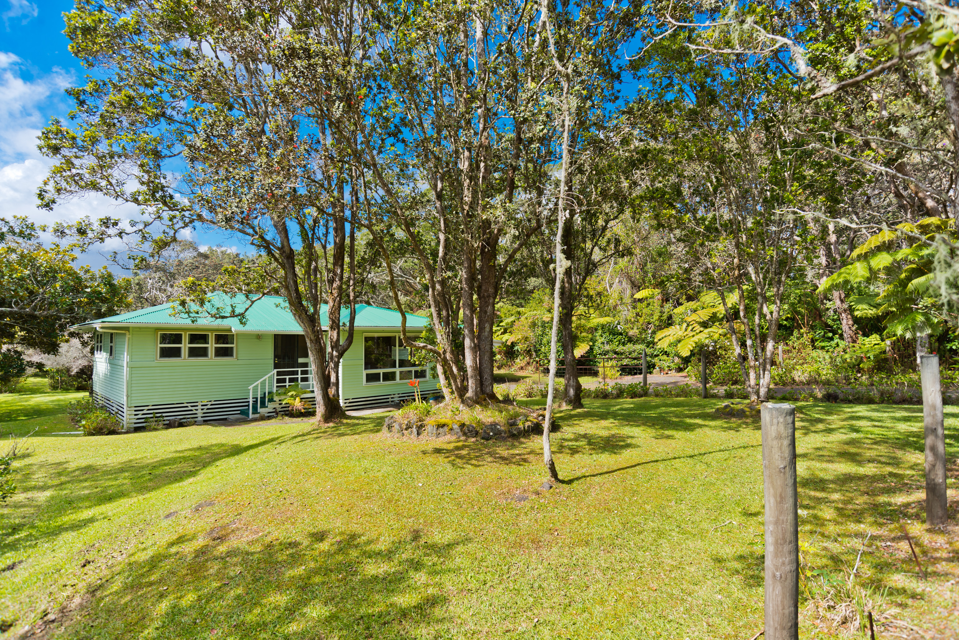 19-4113 Haunani Road Volcano, HI 96785 - Photo 2 of 30 a view of yard with swimming pool