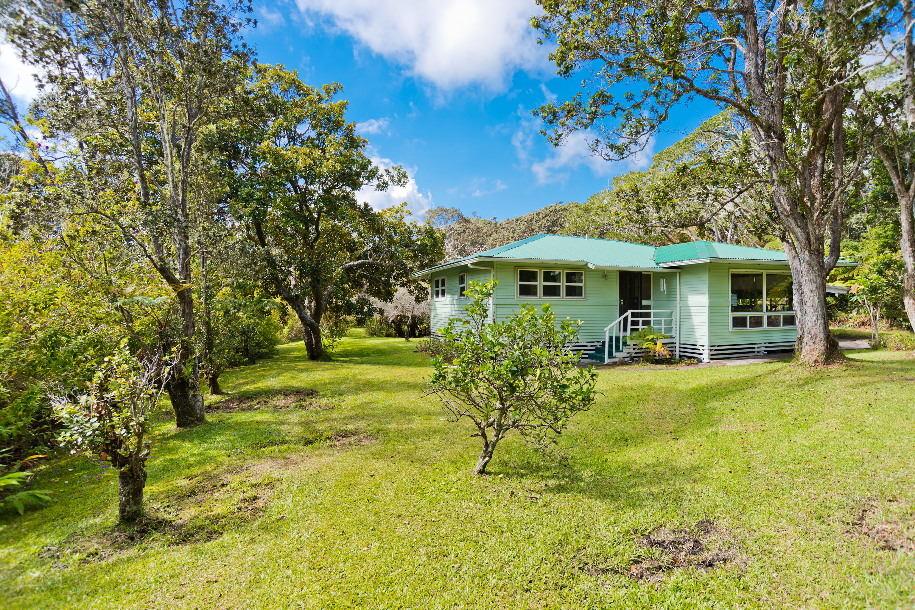 19-4113 Haunani Road Volcano, HI 96785 - Photo 3 of 30 a view of a house with a yard