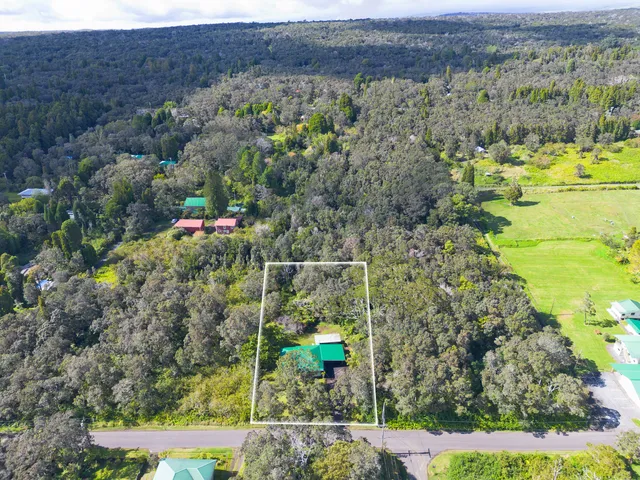 a view of a yard with an outdoor space