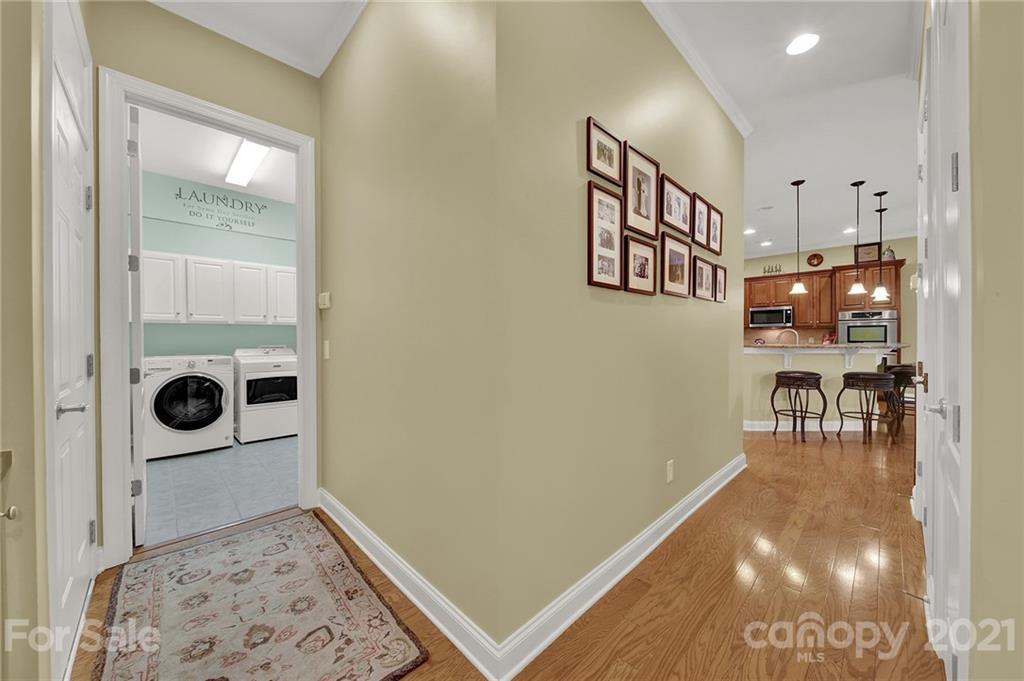 392 Windell Drive Fort Mill, SC 29708 - Photo 17 of 40 a view of a hallway with a dining area