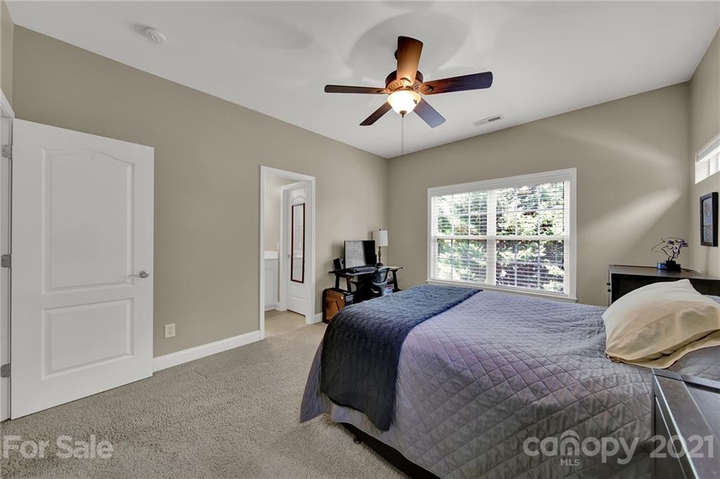 392 Windell Drive Fort Mill, SC 29708 - Photo 23 of 40 a bedroom with a large bed and a window