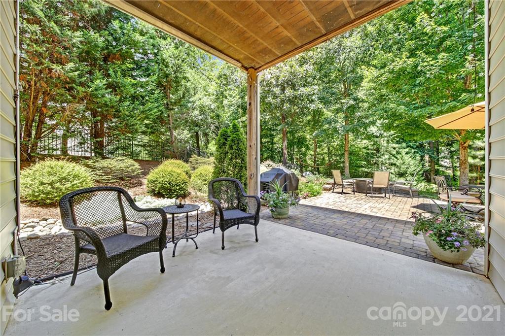 392 Windell Drive Fort Mill, SC 29708 - Photo 36 of 40 a view of a patio with a table and chairs