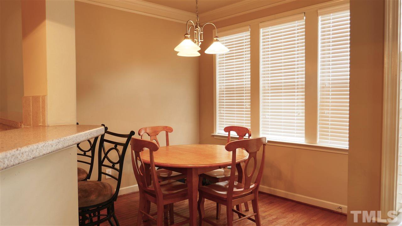 5939 Kohler Lane Raleigh, NC 27616 - Photo 5 of 8 a view of a dining room with furniture and window