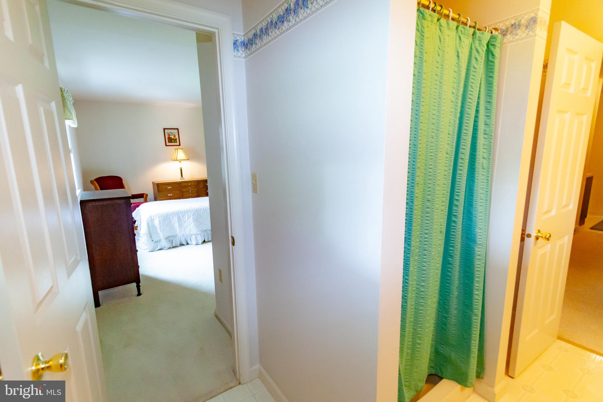 509 Weaver Road Denver, PA 17517 - Photo 21 of 48 a view of a bathroom from a corridor