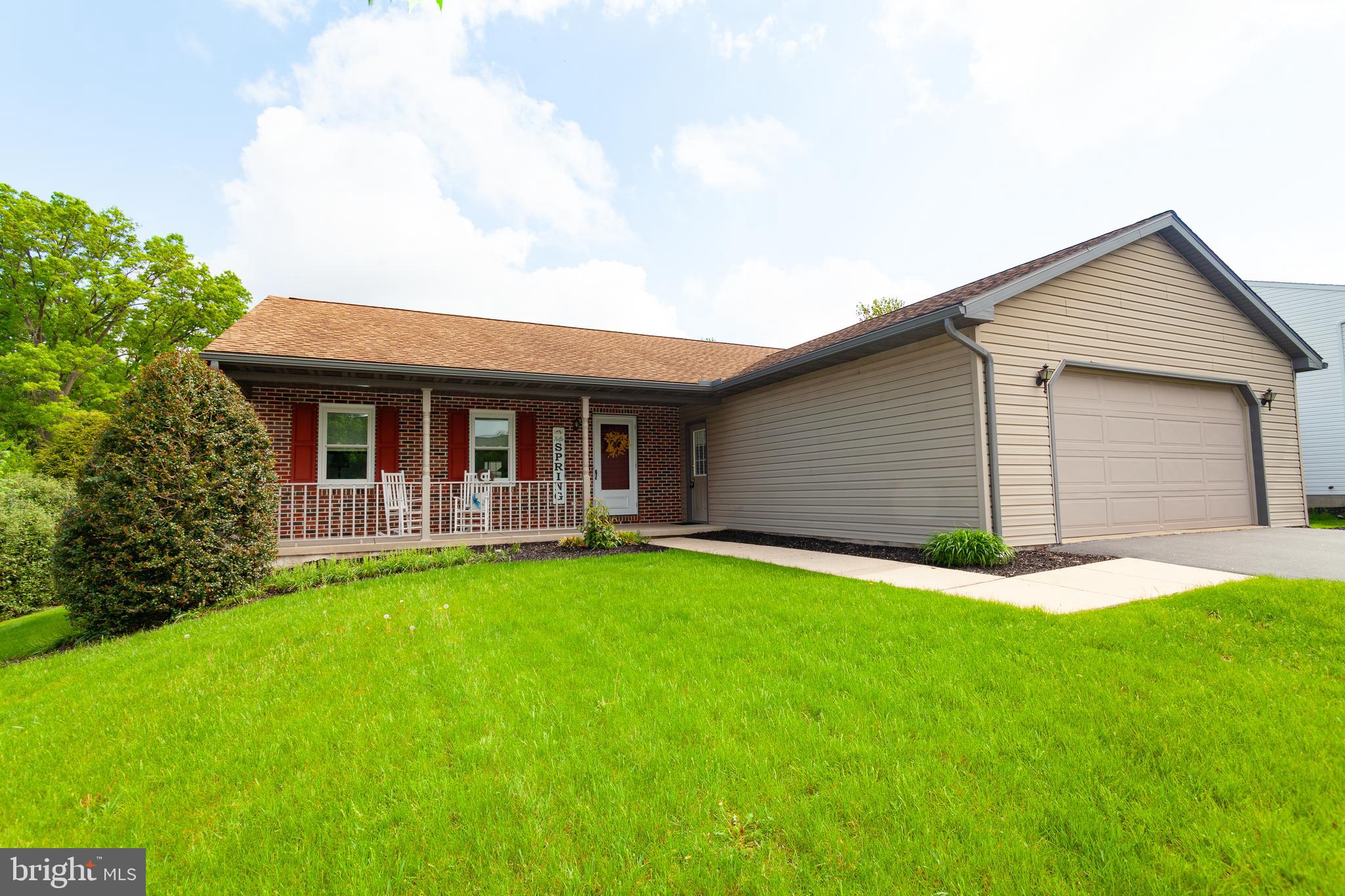 509 Weaver Road Denver, PA 17517 - Photo 3 of 48 a front view of house with yard and green space