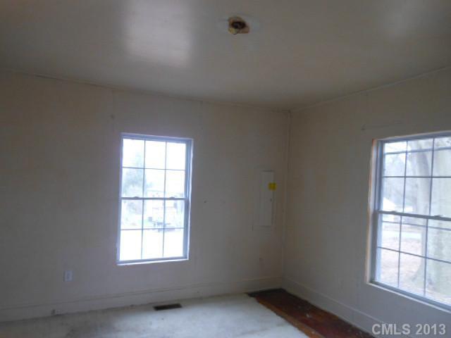 914 Ki Pope Road Belmont, NC 28012 - Photo 3 of 8 an empty room with a window