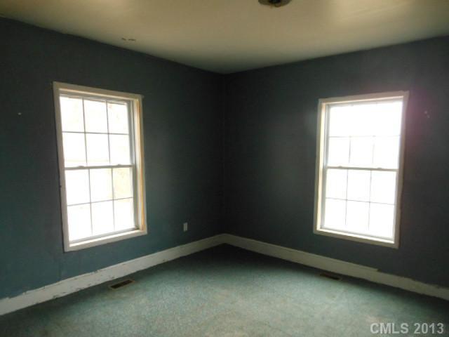 914 Ki Pope Road Belmont, NC 28012 - Photo 4 of 8 an empty room with a window